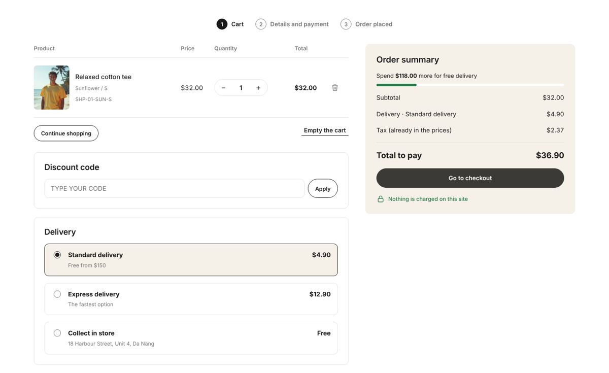 The cart: discount code, delivery choice and the free-delivery bar.